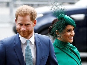 FILE PHOTO: Britain's Prince Harry and Meghan.