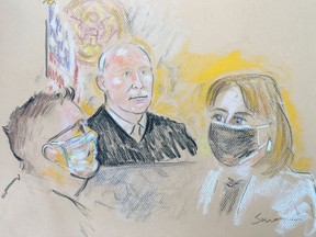 Pascale Cecile Veronique Ferrier, 53, who was arrested on the Canada-U.S. border on suspicion of sending a ricin-filled envelope to the White House and to five other addresses, attends her initial federal court appearance before U.S. Magistrate Judge H. Kenneth Schroeder, Jr. and her defense attorney in a court sketch in Buffalo, New York on Tuesday.