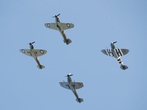 The Royal Airforce's Spitfire planes fly over Westminster Abbey after the "Service of Thanksgiving and Rededication to mark the 80th anniversary of the Battle of Britain", in London, Britain, September 20, 2020.