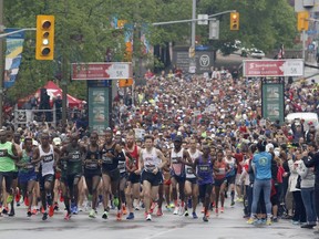 Runners leave the start line of the Scotiabank Ottawa Marathon on May 26, 2019.