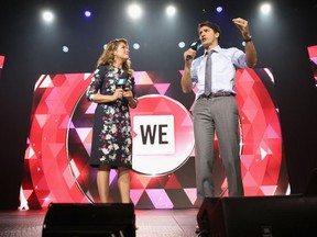 Sophie Gregoire Trudeau, left, and Prime Minister Justin Trudeau speak on stage at a WE Charity event in New York in 2017.