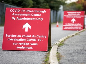A drive-through assessment centre on Coventry Road. Better paid sick leave would prevent future deaths.