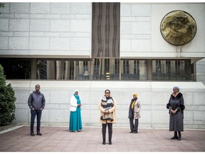 Justice for Abdirahman members, L-R: Billeh Hamud, Nimao Ali, Ifrah Yusuf, Farhia Ahmed and Dahabo Ahmed Omer, outside the court house, Sunday October 18, 2020.