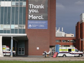 A patient arriving by ambulance at the Emergency of the Civic Hospital in Ottawa on Thursday.