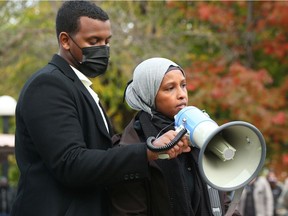 Farhia Ahmed of The Justice for Abdirahman Abdi Coalition speaks during a rally for Justice for Abdi was held at Confederation Park in Ottawa, October 20 2020.