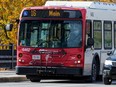 An OC Transpo bus operator drives on the Mackenzie King Bridge on Tuesday, Oct. 27, 2020.