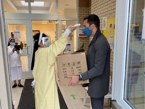 Ontario Education Minister Stephen Lecce posted this photo to his Twitter account after delivering some personal protective equipment (PPE) to the Sisters of Our Lady of Mount Carmel in Maple, Ont., on Tuesday, Oct. 20, 2020.