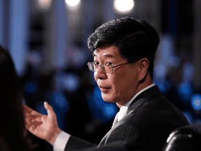 When a reporter asked China's Ambassador to Canada Cong Peiwu if he raised the fate of the quarter-million Canadians living in Hong Kong as a threat, he said simply, "That is your interpretation."