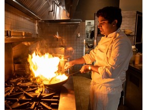 OTTAWA -- Chef/owner Teegavarapu Sarath Mohan cooking in his new restaurant Vivaan on Preston Street. Tuesday, Oct. 6, 2020.