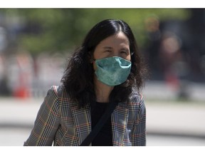 Canada's Chief Public Health Officer , Dr. Theresa Tam, arrives at West Block for a news conference. Maybe she's not putting out a stark enough message.