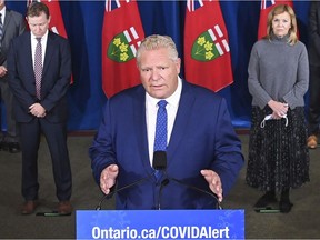 Ontario Premier Doug Ford holds a press conference with his medical team regarding new restrictions at Queen's Park during the COVID-19 pandemic in Toronto on Friday, Oct. 2, 2020.