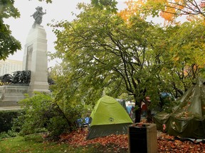 The tent city that popped up beside Canada's National War Memorial is now in it's third month.

The tent city that popped up beside Canada's National War Memorial is now in it's third month, as the city and police wait for a decision from the federal government about what to do about it. 

While the encampment is obscured by a canopy of trees around it, the dozen or so tents are still visible from the memorial. 

Julie Oliver/POSTMEDIA