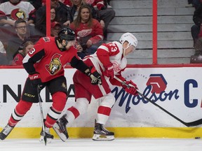 Ottawa Senators left wing Nick Paul and Detroit Red Wings left wing Adam Erne battle in the first period at the Canadian Tire Centre.