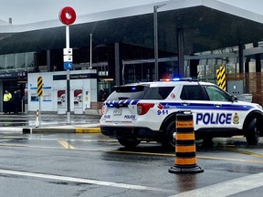 OTTAWA- October 13, 2020. Ottawa police say a suspicious package was found aboard an OC Transpo bus at Tunney's Pasture Station this morning. The bus loop is closed as police investigate. Tony Caldwell, Postmedia