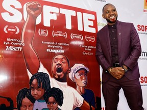 Kenyan social-political activist Boniface Mwangi arrives for the screening of the Kenyan documentary 'Softie' at the Prestige Cinema in Nairobi, Kenya October 16, 2020. Picture taken October 16, 2020.