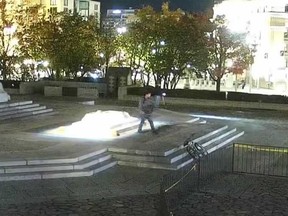 A man riding a bike approached the Memorial, used a sharp object to engrave a hate graffiti on the Tomb of the Unknown Soldier.