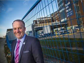 Cameron Love, president and chief executive officer of The Ottawa Hospital, stands beside the location for a temporary 40-bed unit.