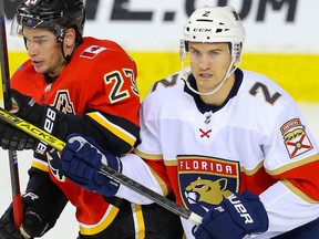 FILE: Calgary Flames Sean Monahan battles against Josh Brown of the Florida Panthers.