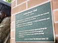 A file photo of a plaque placed in memory of Abdirahman Abdi.