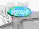 Files: Logo on a Rexall pharmacy 