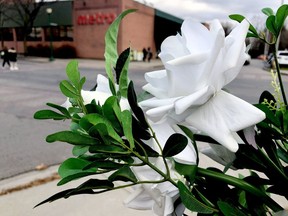 A floral memorial remains Friday near the spot where Parinaz Motahedin, 42, was struck by a vehicle and died on Oct. 10.