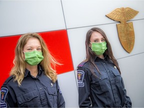 Emma Freeman-Harkin (left) and her mentor Dominique Von Getz coached two moms through two births while on back-to-back shifts at the Ottawa ambulance dispatch centre.
