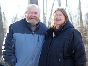 Jim and Sherry Beattie are survivors of heart and stroke, pictured outside their Erinsville home on Wednesday, Nov. 18, 2020. The couple and many others with underlying medical conditions, have found comfort in online survivor communities while they take extra precautions to stay home and away from possible exposure to COVID-19.