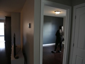 Jessica Brutus in her empty apartment last week. After her goods were packed up by a moving company, the price changed dramatically.