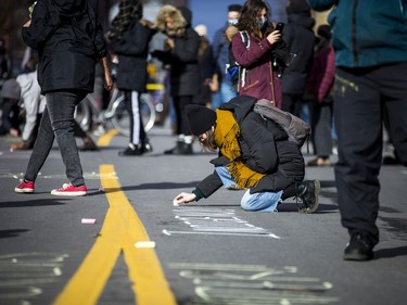 Protesters for Indigenous and Black rights rallied outside Ottawa police headquarters on Elgin Street, Saturday, Nov. 21, 2020, where they demanded the release of 12 people arrested early Saturday morning, after another protest was shut down.