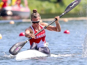 File photo/ Maddy Schmidt competes in an international kayak competition at Duisburg, Germany.