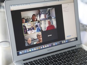 Steve Collis talk with family members in Delaware and Ohio on a ZOOM call on Thanksgiving Day on November 26, 2020 in Valrico, Florida. Americans celebrate the Thanksgiving holiday as coronavirus surge across the country.