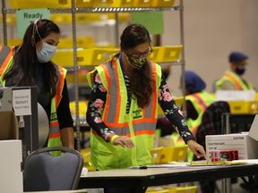 PHILADELPHIA - Election workers count ballots on Nov. 4.