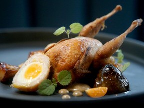 Quail with sunchokes, ground cherries, burnt garlic and Scotch egg at Aiana.