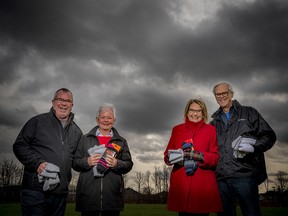 From left: David Sereda, Debi Sereda, Marion Rattray and David Rattray, the faces behind Socks for the Homeless. Instead of being able to collect new or gently used socks in their usual manner with donation boxes, they will for the first time be asking for financial donations.