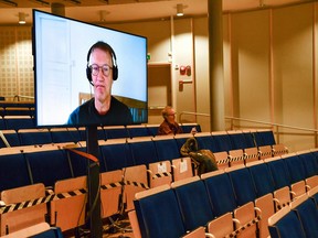 Chief epidemiologist Anders Tegnell of the Public Health Agency of Sweden appears on a screen as he speaks during a digital news conference updating on the coronavirus Covid-19 pandemic situation, in Stockholm, Sweden on November 17, 2020.