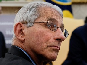 Files: Dr. Anthony Fauci attends a coronavirus response meeting in April, 2020