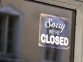 A sign reading "Sorry, we're closed"