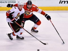 Logan Brown tries to protect the puck during a Senators game against the Panthers in Sunrise, Fla., last December.
