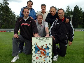 Tony Waiters, middle front, poses for a 2011 photo with members of Canada's 1986 World Cup team: top left to right Bob Lenarduzzi, Colin Miller, Carl Valentine. front left Paul Dolan and front right Dale Mitchell.