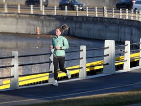 What a difference a few days make in Ottawa Thursday Nov 5, 2020. A woman jogging in the warm sunshine Thursday.   Tony Caldwell