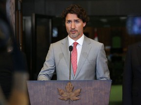 In this file photo taken Canada's Prime Minister Justin Trudeau speaks during a news conference on Parliament Hill in Ottawa, Canada.