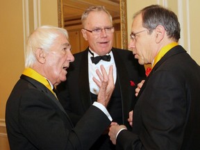 From left, author Richard Gwyn, former diplomat Colin Robertson and Citizen columnist and author Andrew Cohen in animated discussion at the Politics and the Pen dinner in Ottawa in 2014.