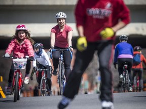 In the spring, people were out enjoying the Queen Elizabeth Driveway in Ottawa, which was closed to traffic to allow people to have more outdoor space to use.
