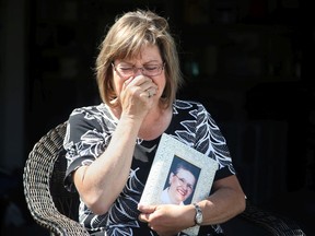 Louise Savoie tries to hold back the tears, but can't when she talks about how her mom, Therese Savoie, 83 (in picture), died alone at the Montfort long-term care facility.