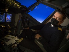 Yev Zhukov, of GoSimGo in the seat of his Boeing 737 flight simulator at Gatineau airport.
