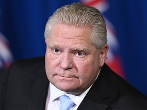 Ontario Premier Doug Ford holds a press conference at Queen's Park during the COVID-19 pandemic in Toronto on Monday, December 21, 2020.