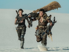 Hunting and gathering weapons: Milla Jovovich and Tony Jaa in Monster Hunter.