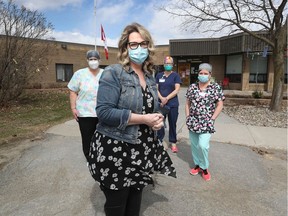 Carolyn Della Foresta (foreground), Administrator of Almonte Country Haven with staff Wendy Howard-Seguin, Christine Hube and Joanne Neil