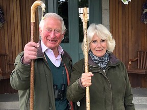 This handout image shows the 2020 Christmas card of Prince Charles, Prince of Wales and Camilla, Duchess of Cornwall, taken in the early autumn at Birkhall, Scotland.