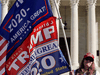 A supporter of U.S. President Donald Trump stands in front of the U.S. Supreme Court as it reviews a lawsuit filed by Texas seeking to undo President-elect Joe Biden's election win, in Washington, December 11, 2020.